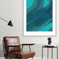Picture frame by a reading coffee table in a living room