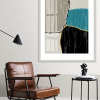 Picture frame by a reading coffee table in a living room