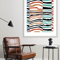 Picture frame by a reading coffee table in a living room